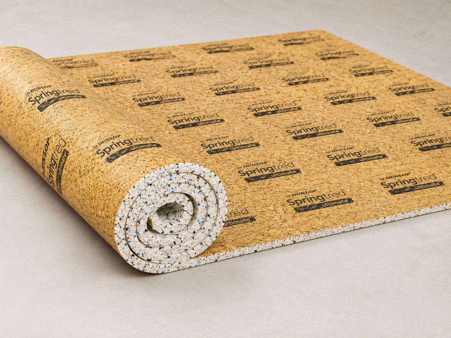 Dunlop Springtred carpet underlay shown as a clean yellow underlay layer