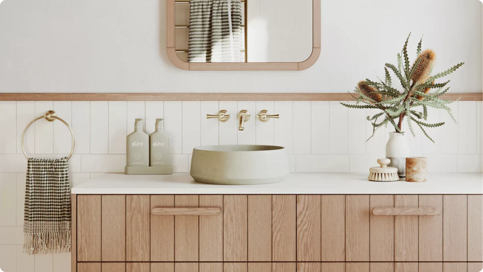 Farmhouse basin mixer installed on a timber vanity with an above-counter vessel basin